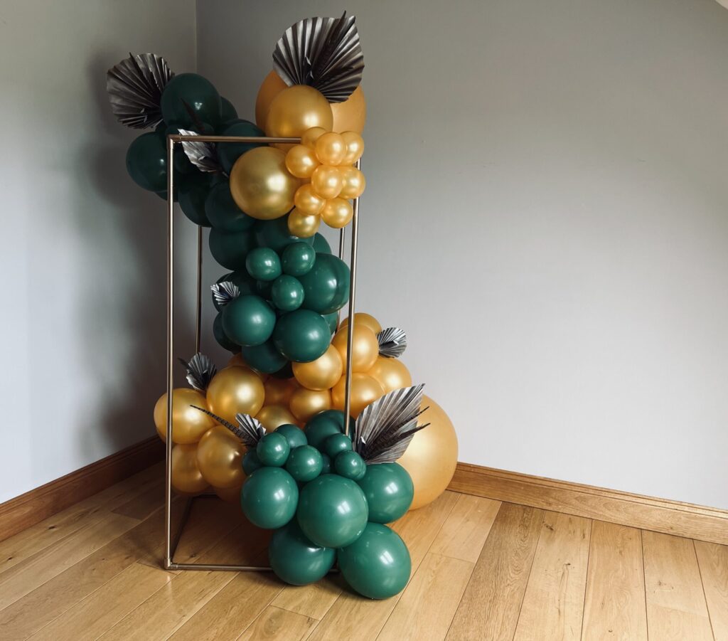 Balloon plinth with props made from wild duck and pheasant feathers.