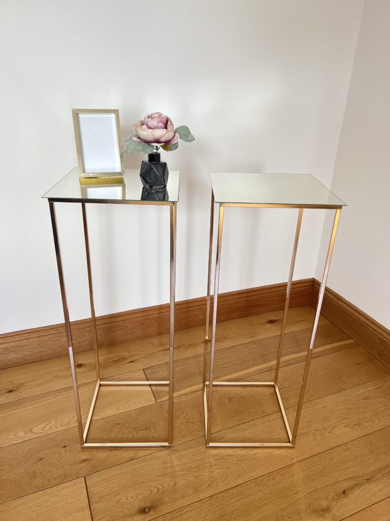 Side tables with mirror top.